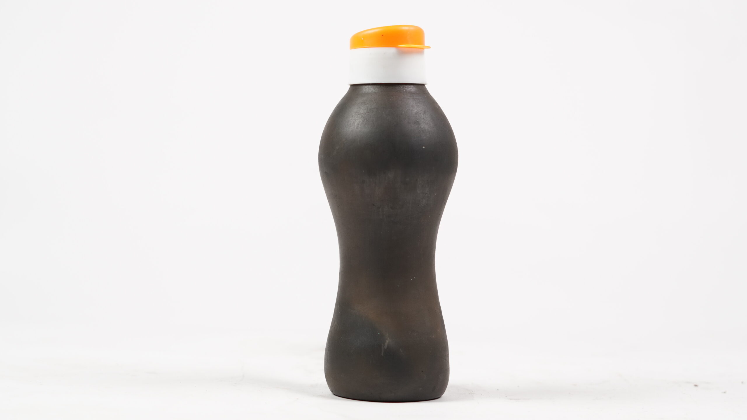 Black Desi Creay bottle